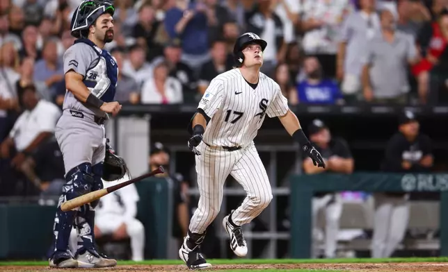 Chicago White Sox's Sam Antonacci (17) drops his bat after hitting a home run as New York Yankees catcher Austin Wells watches during the eighth inning of a baseball game in Chicago, Wednesday, July 29, 2026. (AP Photo/Jessie Alcheh)