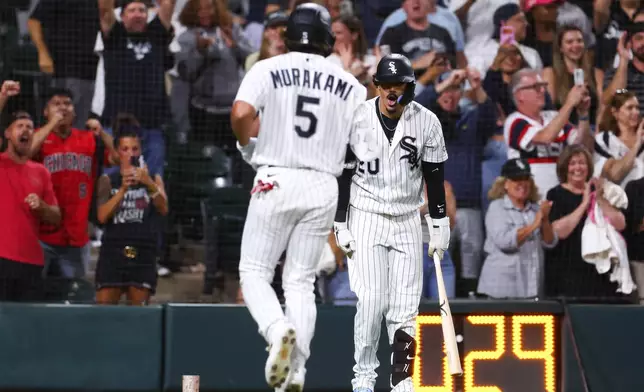 Chicago White Sox's Munetaka Murakami (5) celebrates with Miguel Vargas after hitting a home run during the eighth inning of a baseball game against the New York Yankees in Chicago, Wednesday, July 29, 2026. (AP Photo/Jessie Alcheh)
