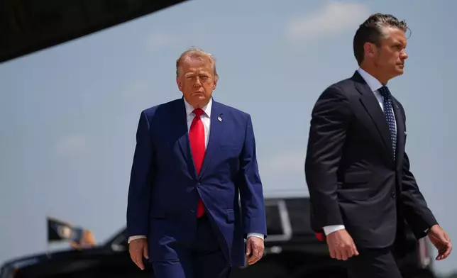 President Donald Trump and Secretary of Defense Pete Hegseth, arrive to attend the dignified transfer of four U.S. service members recently killed in the Middle East, at Dover Air Force Base, Del., Wednesday, July 22, 2026. (AP Photo/Matt Rourke)