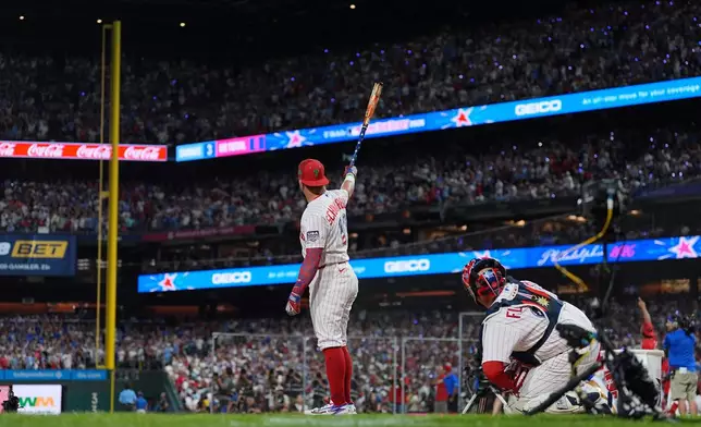 Philadelphia Phillies' Kyle Schwarber gestures during the MLB baseball All-Star Home Run Derby, Monday, July 13, 2026, in Philadelphia. (AP Photo/Matt Rourke)