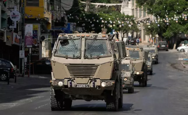 Israeli soldiers operate in the West Bank Palestinians city of Nablus, Sunday, July 26, 2026. (AP Photo/Majdi Mohammad)