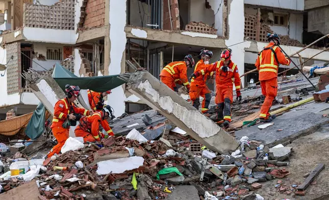 UK ISAR (International Search and Rescue) are pictured in Caraballeda, La Guaira, Venezuela Tuesday, June 30, 2026, following two powerful earthquakes. (Miguel Medina/Pool Photo via AP)