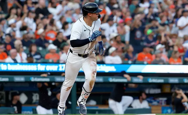 Detroit Tigers' Spencer Torkelson watches his three-run home run against the Athletics during the fifth inning of a baseball game Wednesday, July 8, 2026, in Detroit. (AP Photo/Duane Burleson)