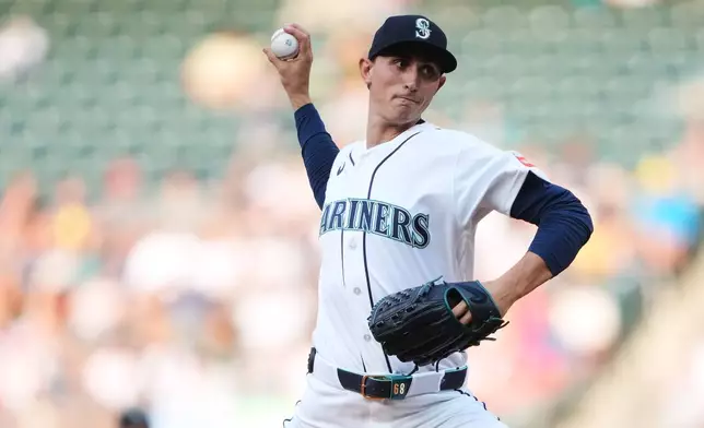 Seattle Mariners starting pitcher George Kirby throws against the Cincinnati Reds during the first inning of a baseball game, Monday, July 20, 2026, in Seattle. (AP Photo/Lindsey Wasson)