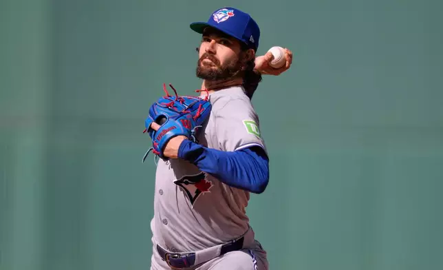 Toronto Blue Jays' Dylan Cease starting pitcher delivers during the first inning of a baseball game against the Boston Red Sox, Saturday, July 25, 2026, in Boston. (AP Photo/Charles Krupa)