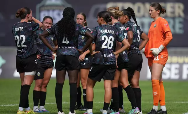 Vancouver Rise FC players talk after a goal scored by Toronto AFC during a NSL match in Burnaby, British Columbia, Sunday, June 28, 2026. (AP Photo/Abbie Parr)