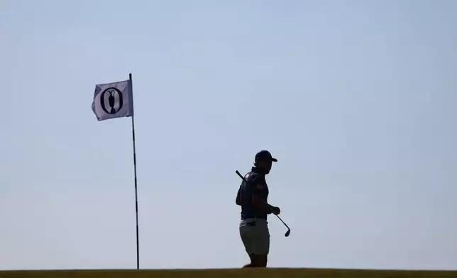 Ireland's David Howard lines on the 16th green during a practice round at the British Open Golf Championship at Royal Birkdale, Southport, England, Monday, July 13, 2026. (AP Photo/Peter Morrison)
