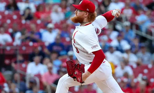 St. Louis Cardinals starting pitcher Dustin May throws during the first inning of a baseball game against the Chicago Cubs Wednesday, July 29, 2026, in St. Louis. (AP Photo/Scott Kane)