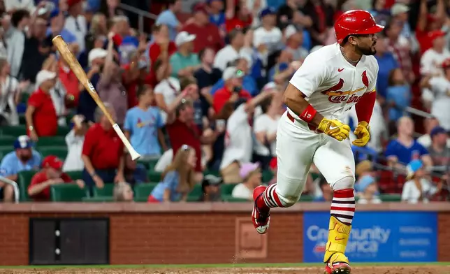 St. Louis Cardinals' Iván Herrera watches the ball as he runs for a two RBI walk-off double during the tenth inning of a baseball game against the Chicago Cubs, Wednesday, July 29, 2026, in St. Louis. (AP Photo/Scott Kane)