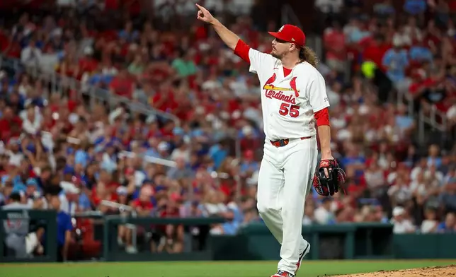 St. Louis Cardinals' Ryne Stanek reacts after striking out Chicago Cubs' Dansby Swanson to end the top of the seventh inning during a baseball game against the Chicago Cubs Wednesday, July 29, 2026, in St. Louis. (AP Photo/Scott Kane)