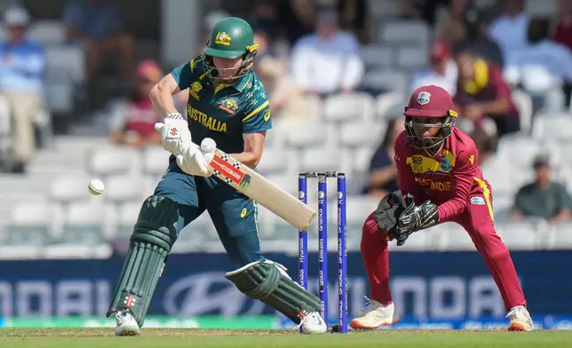 Australia's Beth Mooney plays a shot during the Women's T20 Cricket World Cup semifinal between Australia and West Indies in London, Tuesday, June 30, 2026. (AP Photo/Alastair Grant)