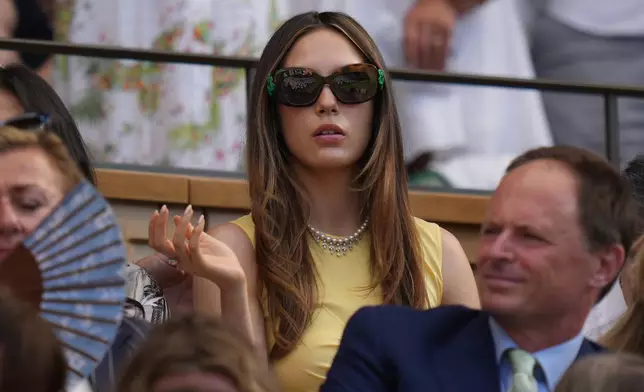 Skier Eileen Gu watches the women's singles final at Wimbledon Tennis Championships in London, Saturday, July 11, 2026. (AP Photo/Kirsty Wigglesworth)