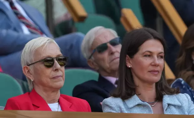 Martina Navratilova, left, and Julia Lemigova sit in the royal box on day 13 of the Wimbledon Tennis Championships in London, Saturday, July 11, 2026. (AP Photo/Kirsty Wigglesworth)