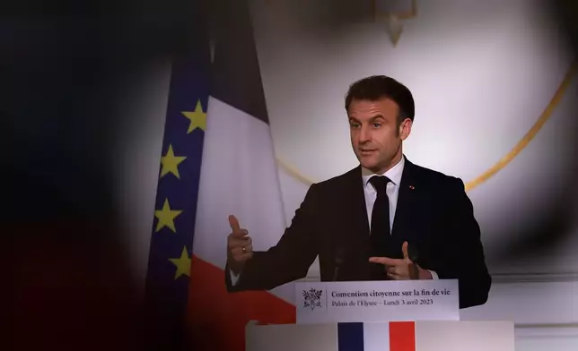 FILE - French President Emmanuel Macron delivers his speech on the end-of-life options, April 3, 2023, at the Elysee Palace in Paris. (AP Photo/Aurelien Morissard, Pool, File)
