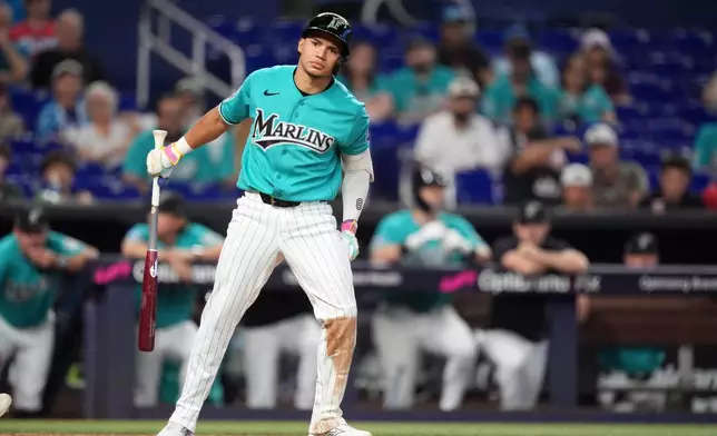 Miami Marlins' Javier Sanoja reacts during his at-bat in the ninth inning of a baseball game against the San Diego Padres, Sunday, July 26, 2026, in Miami. (AP Photo/Rebecca Blackwell)