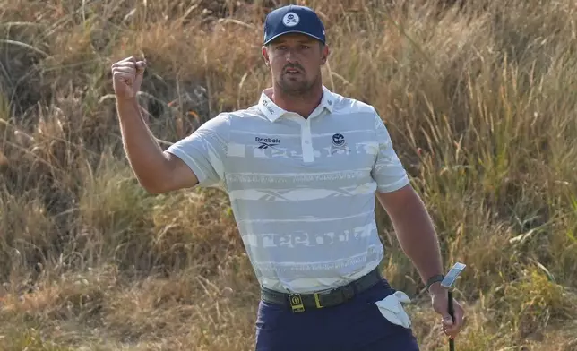 Bryson DeChambeau of the United States reacts after getting a birdie on the 6th green during the third day of the British Open Golf championships at Royal Birkdale golf club, in Southport, England, Saturday, July 18, 2026. (AP Photo/Jon Super)