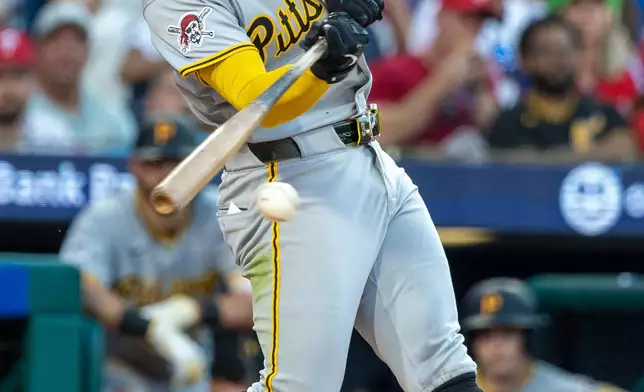 Pittsburgh Pirates' Nick Gonzales hits a single in the fourth inning of a baseball game against the Philadelphia Phillies, Tuesday, June 30, 2026, in Philadelphia. (AP Photo/Laurence Kesterson)