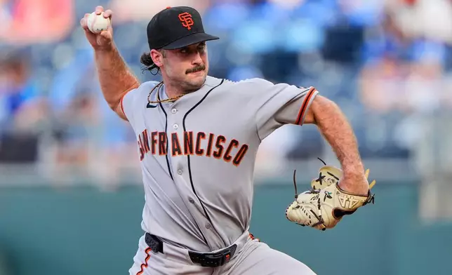 San Francisco Giants starting pitcher Trevor McDonald throws during the first inning of a baseball game against the Kansas City Royals, Monday, July 20, 2026, in Kansas City, Mo. (AP Photo/Charlie Riedel)