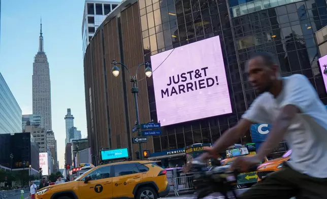 A "Just Married" sign is displayed on Madison Square Garden during a wedding between singer Taylor Swift and National Football League player Travis Kelce on Friday, July 3, 2026, in New York. (AP Photo/Ryan Murphy)