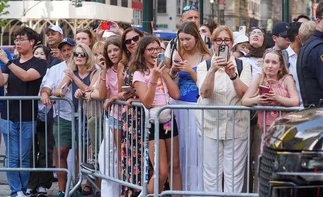 Fans line up outside of Madison Square Garden ahead of a reported wedding between singer Taylor Swift and National Football League player Travis Kelce on Friday, July 3, 2026, in New York. (AP Photo/Ryan Murphy)