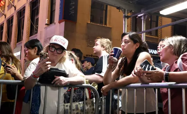 Fans of Taylor Swift stand outside of Madison Square Garden on Friday, July 3, 2026, in New York. (Photo by Andy Kropa/Invision/AP)