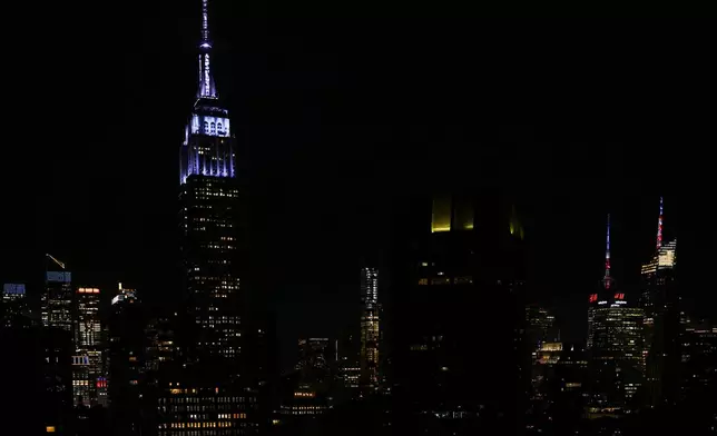 The Empire State Building lit up as "her something blue" for Taylor Swift and Travis Kelce's wedding on Friday, July 3 2026, in New York. (Photo by Evan Agostini/Invision/AP)