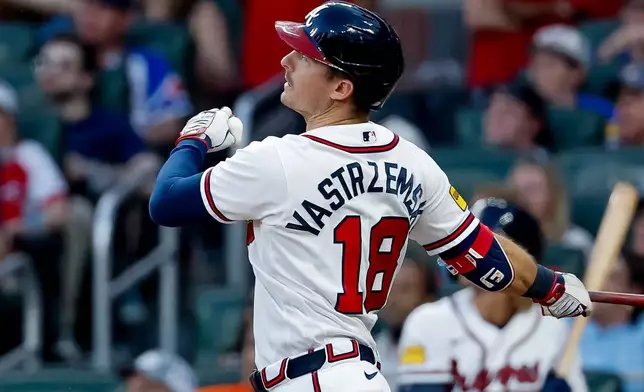 Atlanta Braves' Mike Yastrzemski hits a two-run home run against the Washington Nationals during the fifth inning of a baseball game, Thursday, July 30, 2026, in Atlanta. (AP Photo/Erik S. Lesser)