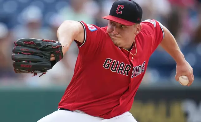 Cleveland Guardians' Parker Messick pitches in the first inning of a baseball game against the Minnesota Twins in Cleveland, Tuesday, July 21, 2026. (AP Photo/Sue Ogrocki)