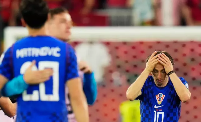 Croatia's Luka Modric (10) reacts after losing to Portugal in a World Cup round of 32 soccer match, in Toronto on Thursday, July 2, 2026. (Chris Young/The Canadian Press via AP)