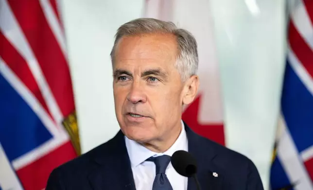 Prime Minister Mark Carney speaks in Vancouver, on Thursday, July 2, 2026. (Ethan Cairns/The Canadian Press via AP)
