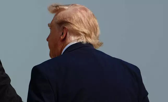 President Donald Trump arrives at Bismarck Municipal Airport, Wednesday, July 1, 2026, in Bismarck, N.D. (AP Photo/Julia Demaree Nikhinson)