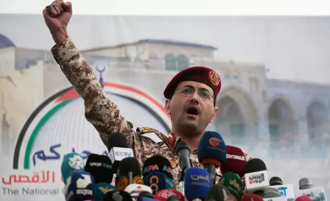 FILE - Houthi military spokesman Yahya Saree speaks at a rally against the U.S. and Israel in Sanaa, Yemen, April 18, 2025. (AP Photo/Osamah Abdulrahman, File)