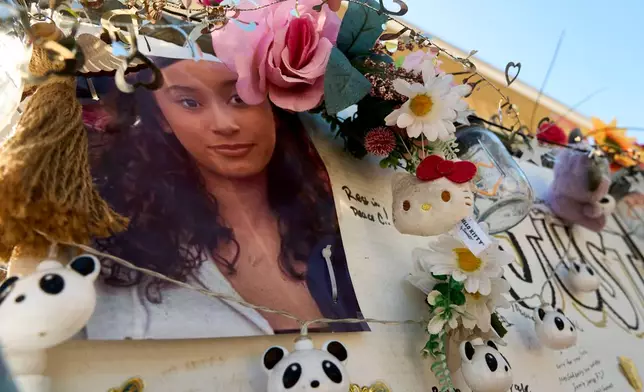 FILE - A makeshift memorial for Celeste Rivas Hernandez, whose body was found inside a vehicle owned by singer D4vd, is displayed outside her home in Lake Elsinore, Calif., on April 21, 2026. (AP Photo/Damian Dovarganes, File)