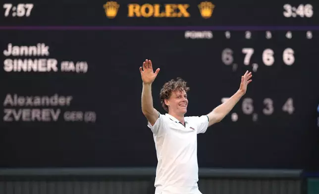 Jannik Sinner of Italy reacts to winning against Alexander Zverev of Germany in the men's singles final at Wimbledon Tennis Championships in London, Sunday, July 12, 2026. (AP Photo/Kirsty Wigglesworth)