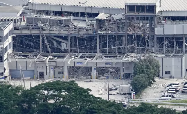 This aerial image shows AEON Mall, which was destroyed by an explosion following an earthquake, in Kashima, Kumamoto Prefecture, on Wednesday, July 29, 2026. (Naoki Hiraoka/Kyodo News via AP)