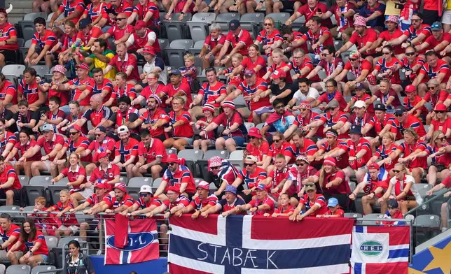 Norwegian fans perform a viking boat row before the World Cup round of 16 soccer match between Brazil and Norway in East Rutherford, N.J., near New York, Sunday, July 5, 2026. (AP Photo/Yuki Iwamura)