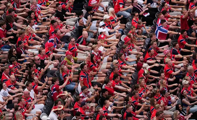 Norway fans celebrate with a viking row chant after the World Cup round of 16 soccer match between Brazil and Norway in East Rutherford, N.J., near New York, Sunday, July 5, 2026. (AP Photo/Matt Slocum)