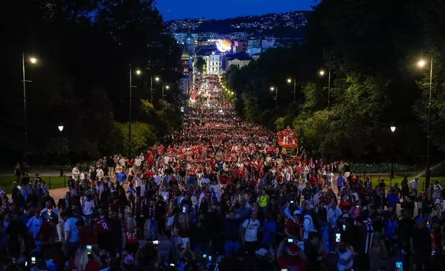 Norway soccer fans gather at Slottsplånse and Karl Johans gate in Oslo, Sunday, July 5, 2026, to celebrate Norway's 2-1 victory over Brazil in a round of 16 World Cup match. (Javad Parsa/NTB Scanpix via AP)