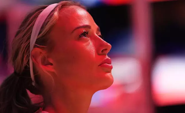 Indiana Fever guard Sophie Cunningham looks on during the national anthem before facing the Seattle Storm a WNBA basketball game, Tuesday, July 28, 2026, in Seattle. (AP Photo/Lindsey Wasson)