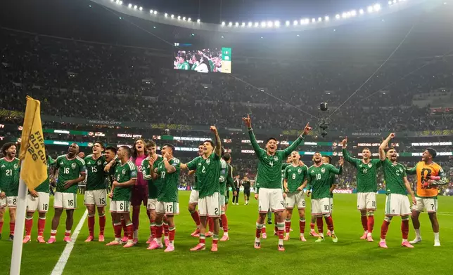 Mexico players celebrate after the World Cup round of 32 soccer match between Mexico and Ecuador in Mexico City, Tuesday, June 30, 2026. (AP Photo/Fernando Llano)