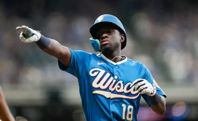 Milwaukee Brewers' Luis Lara reacts to hitting a single to right field during the seventh inning of a baseball game against the Miami Marlins Friday, July 17, 2026, in Milwaukee. (AP Photo/Kayla Wolf)