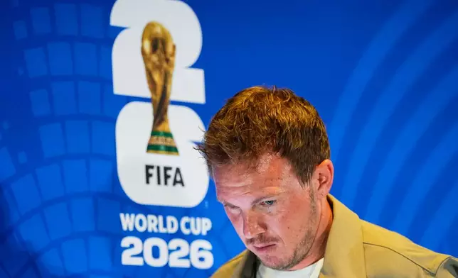Germany head coach Julian Nagelsmann leaves a press conference ahead of the World Cup round of 32 soccer match between Germany and Paraguay in Foxborough, Mass., near Boston, Sunday, June 28, 2026. (AP Photo/Martin Meissner)