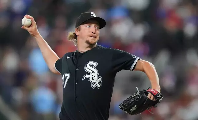 Chicago White Sox starting pitcher Erick Fedde throws during the first inning of a baseball game against the Texas Rangers, Monday, July 20, 2026, in Arlington, Texas. (AP Photo/LM Otero)
