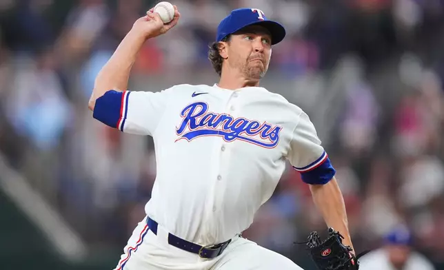 Texas Rangers starting pitcher Jacob Degrom throws during the first inning of a baseball game against the against the Chicago White Sox, Monday, July 20, 2026, in Arlington, Texas. (AP Photo/LM Otero)