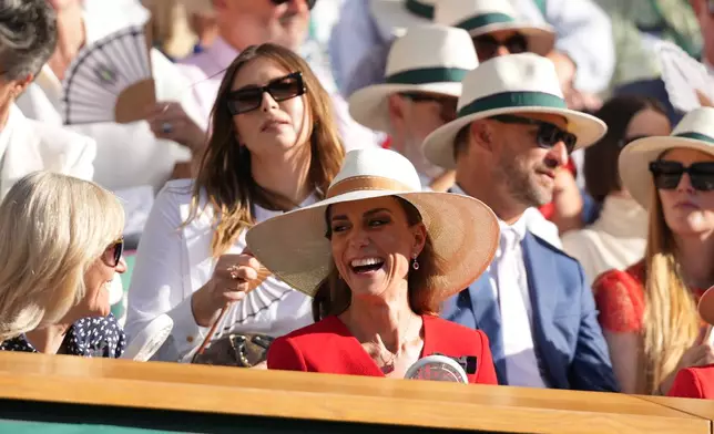Britain's Princess Kate laughs in the royal box as she attends the women's singles final between Linda Noskova of Czech Republic and Karolina Muchova of Czech Republic at Wimbledon Tennis Championships in London, Saturday, July 11, 2026. (AP Photo/Kirsty Wigglesworth)