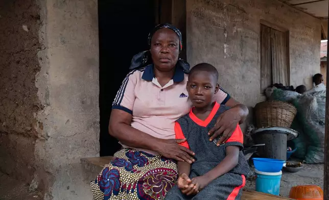 Grace Ojo, mother of Lydia Adewole, a student that was kidnapped with others from a school by al-Qaida-linked fighters is photographed after she was released in Esinele, Southwestern, Nigeria, July 17, 2026. (AP Photo/Pelumi Salako)