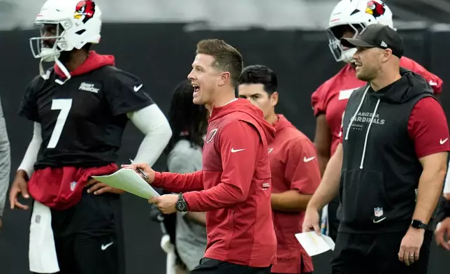 Arizona Cardinals head coach Mike LaFleur shouts instructions to players during NFL football training camp practice, Thursday, July 23, 2026, in Glendale, Ariz. (AP Photo/Ross D. Franklin)