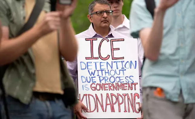 Dr. Nirav Shah, Democratic candidate for U.S. Senate, attends a protest outside a U.S. Immigration and Customs Enforcement facility Scarborough, Maine, one day after the shooting of Johan Sebastián Durán Guerrero, Tuesday, July 14, 2026. (AP Photo/Robert F. Bukaty) CORRECTION: Corrects ID to Johan Sebastián Durán Guerrero NOT Joan Sebastian Guerrero