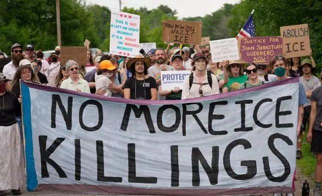Protesters gather near a U.S. Immigration and Customs Enforcement facility Scarborough, Maine, one day after the shooting of Joan Sebastian Guerrero, Tuesday, July 14, 2026. (AP Photo/Robert F. Bukaty)