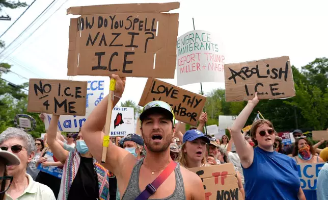 Protesters gather near a U.S. Immigration and Customs Enforcement facility in Scarborough, Maine, one day after the shooting of Johan Sebastián Durán Guerrero, Tuesday, July 14, 2026. (AP Photo/Robert F. Bukaty)